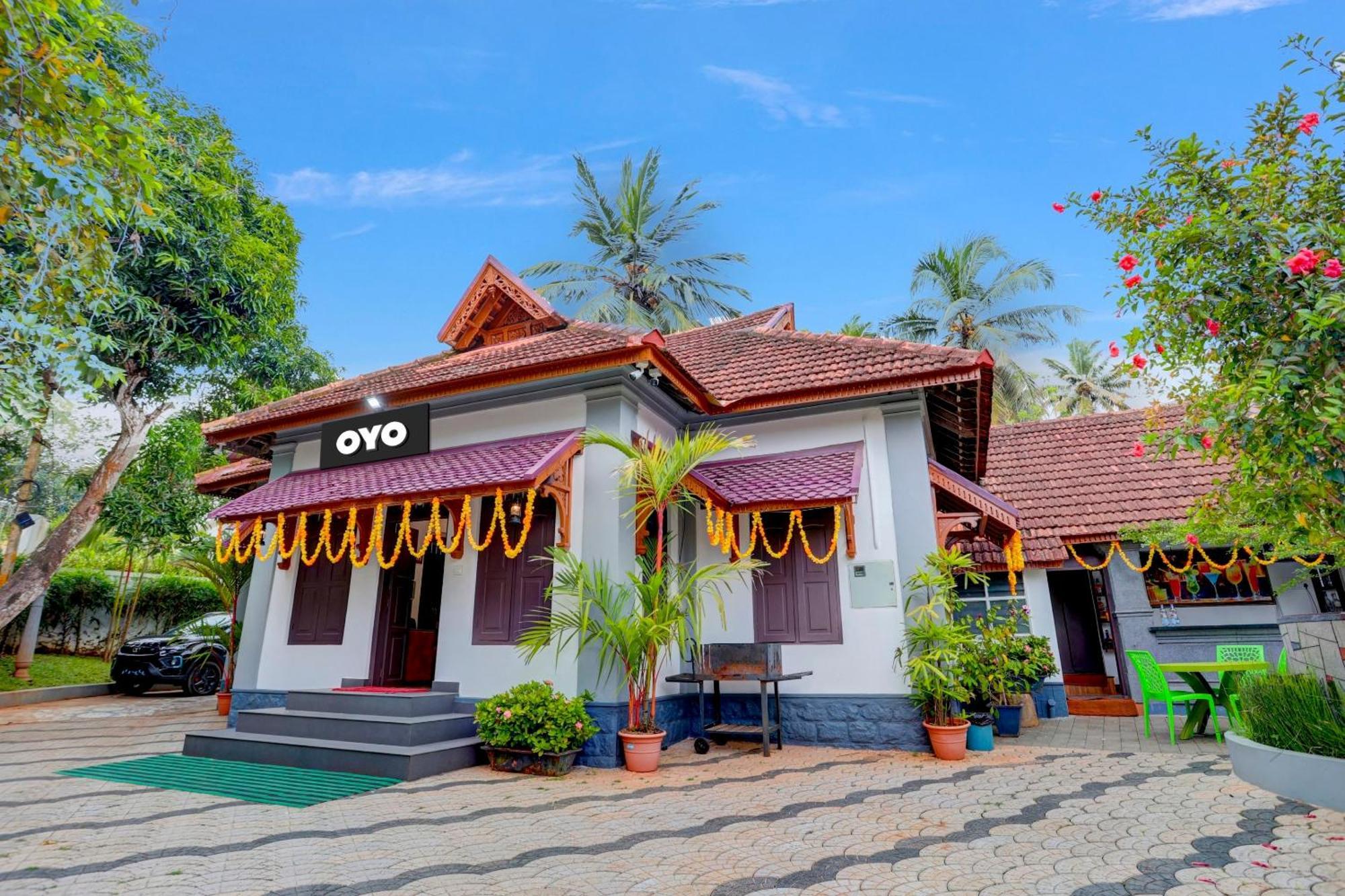 Hotel O Poptavern Heritage Kovalam Bagian luar foto
