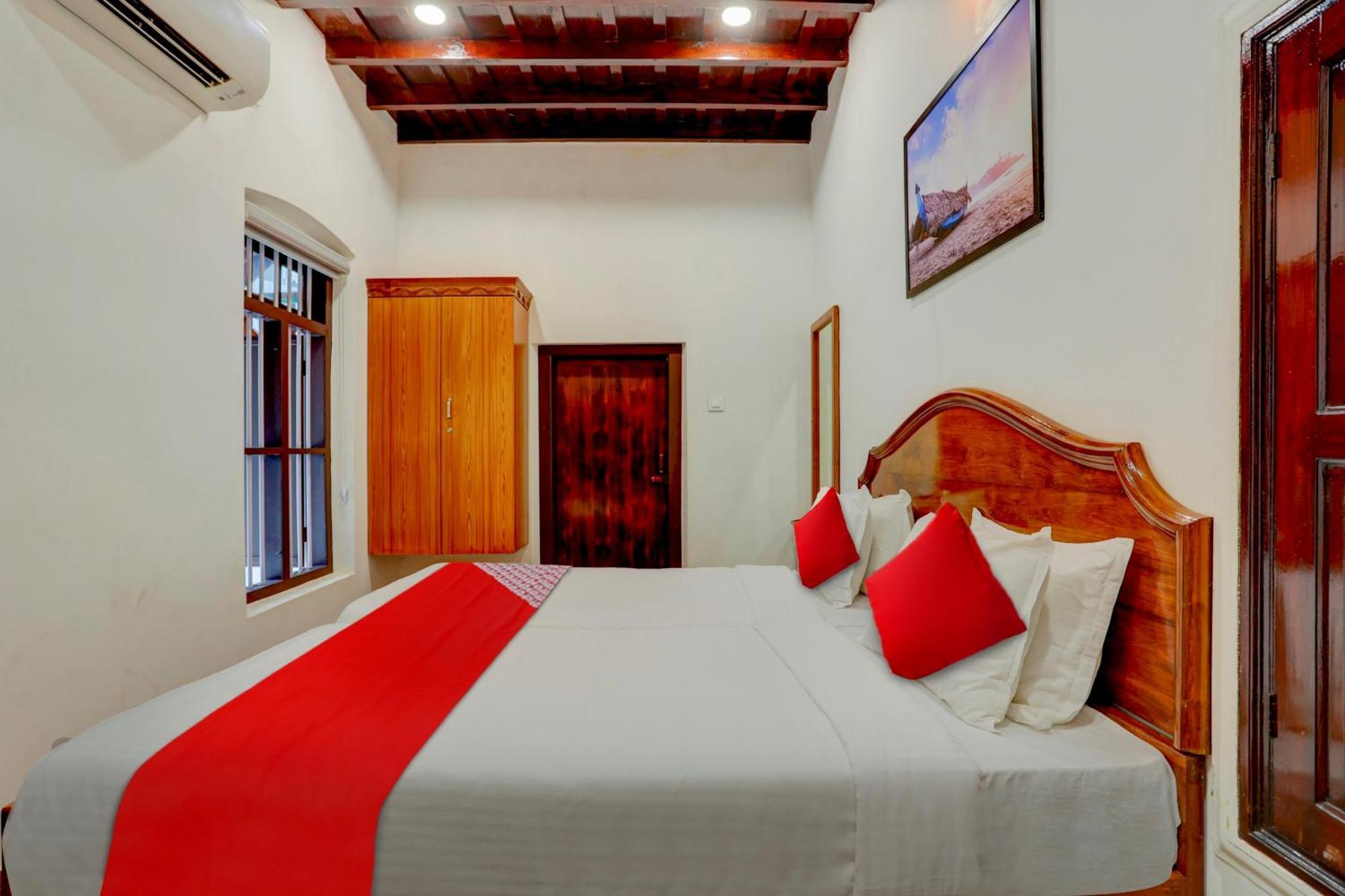 Hotel O Poptavern Heritage Kovalam Bagian luar foto