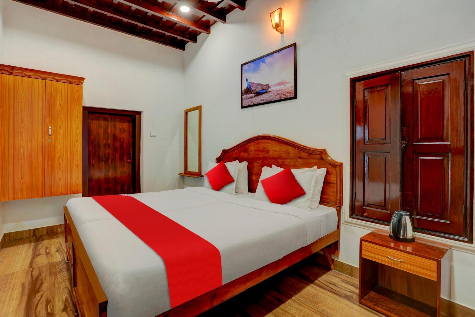 Hotel O Poptavern Heritage Kovalam Bagian luar foto