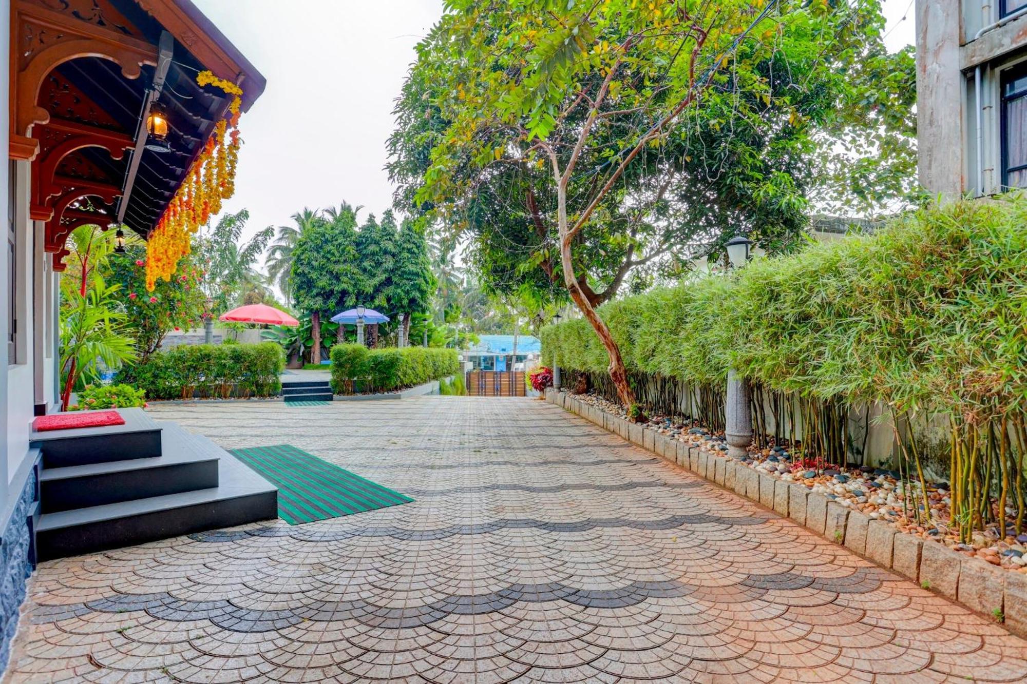 Hotel O Poptavern Heritage Kovalam Bagian luar foto