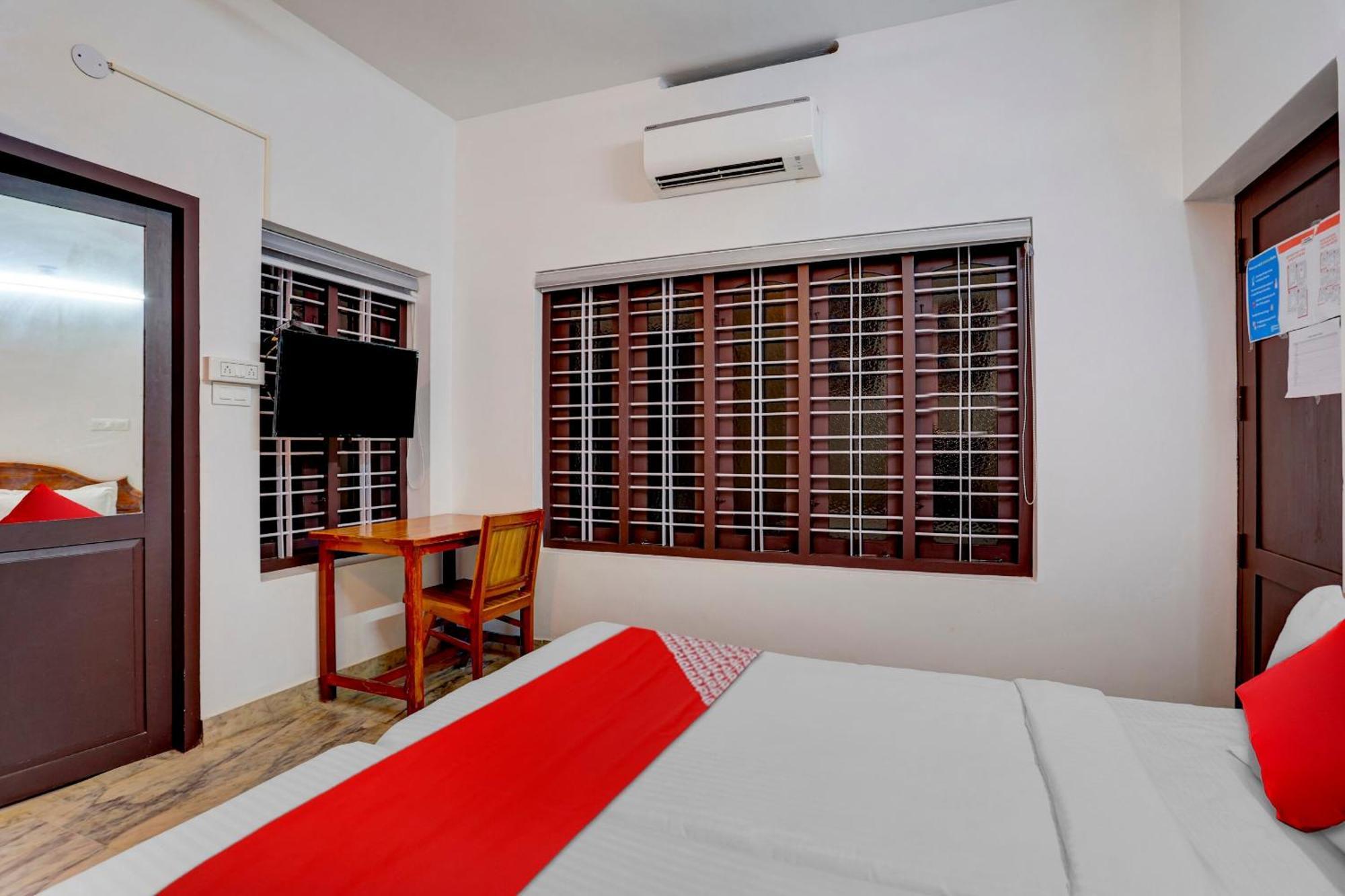Hotel O Poptavern Heritage Kovalam Bagian luar foto