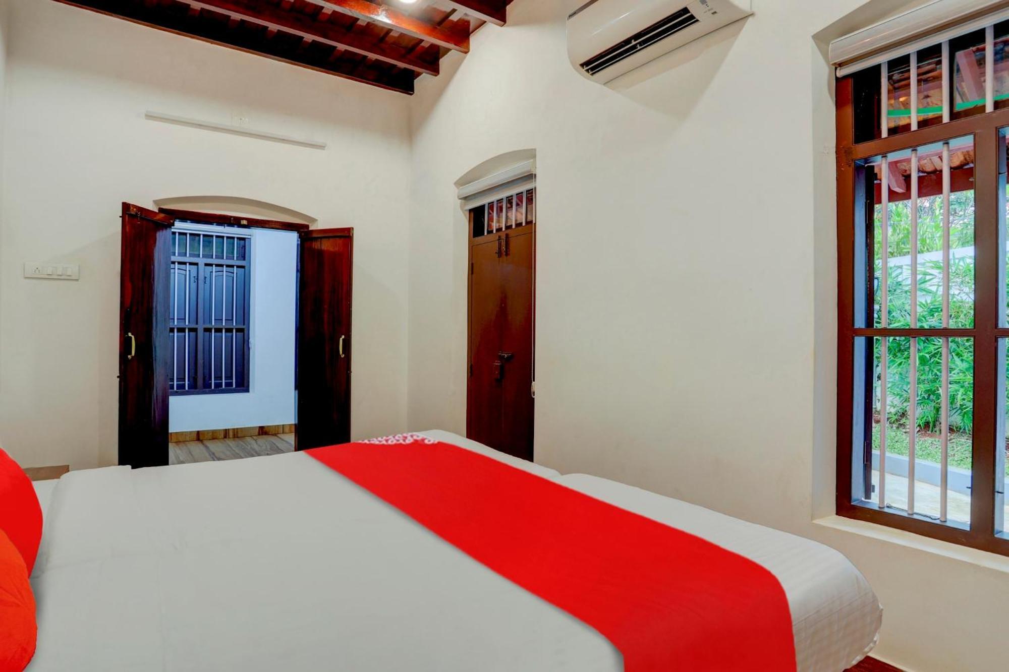 Hotel O Poptavern Heritage Kovalam Bagian luar foto