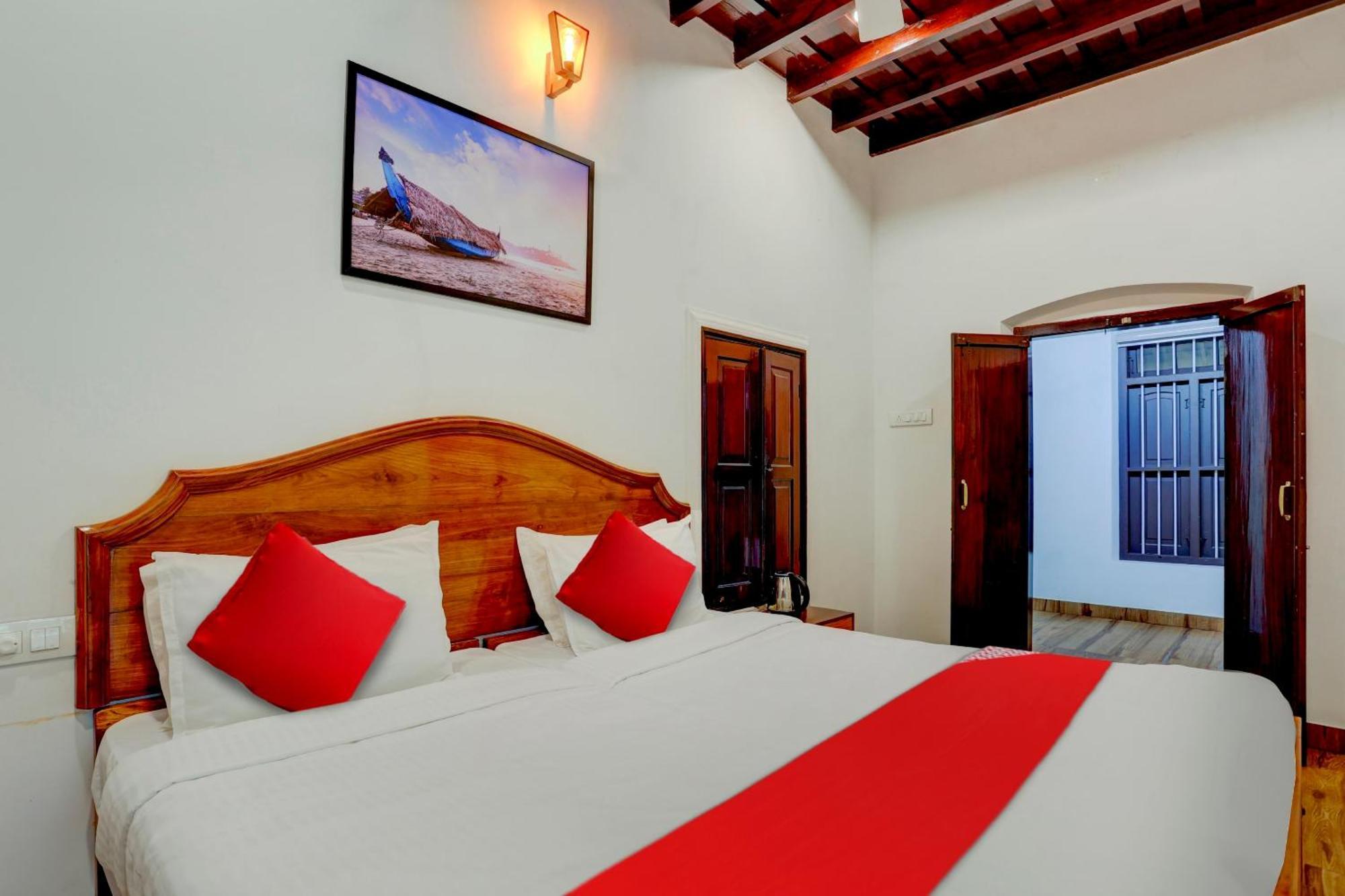 Hotel O Poptavern Heritage Kovalam Bagian luar foto