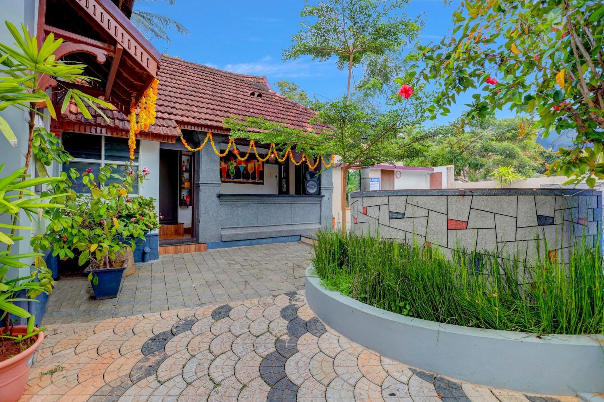 Hotel O Poptavern Heritage Kovalam Bagian luar foto